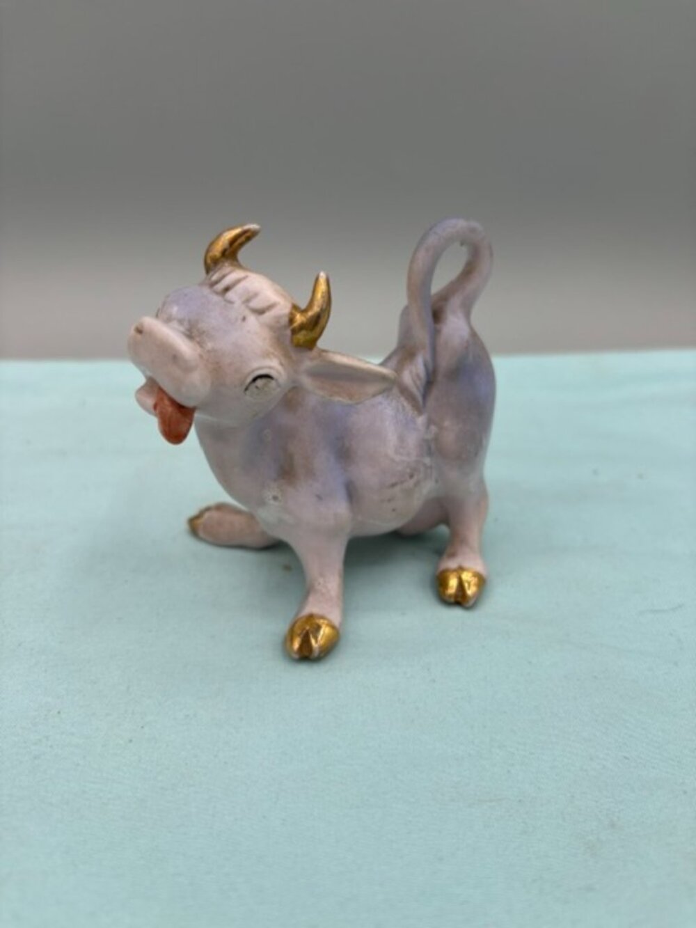 Vintage Mid Century Modern Purple jeweled Rhinestone Cow Figurine statue.